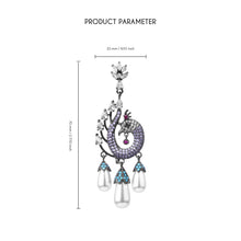 Cargar imagen en el visor de la galería, UJOY Peacock Inspired Drop Earrings – Gunmetal Tone with Purple Crystals &amp; Pearl Tassels